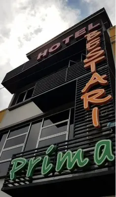 a building with a sign on the side of it at Hotel Bestari Prima in Kuala Lipis