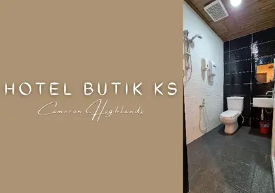 a bathroom with a toilet and a sign that reads hotel buffaloesses at Hotel Butik KS in Brinchang
