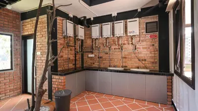 a bathroom with three sinks in a brick wall at Cameron Highland Retreat in Tanah Rata