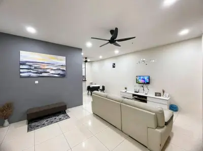 a living room with a couch and a ceiling fan at CozyHouse 4ROOM 3BATH ROOM 10PAX```SimpangAmpatTasek in Simpang Ampat