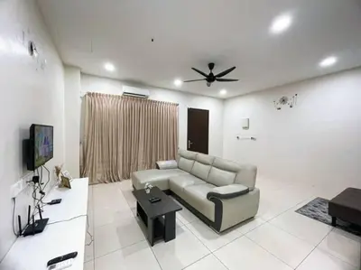 a living room with a couch and a ceiling fan at CozyHouse 4ROOM 3BATH ROOM 10PAX```SimpangAmpatTasek in Simpang Ampat
