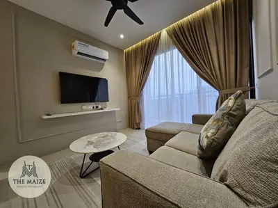 a living room with a couch and a flat screen tv at The Cove Hillside Residence Ipoh - Downtown Delight in Ipoh