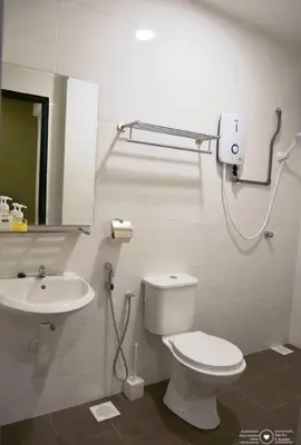 a bathroom with a toilet and a sink at Casa Kayangan Meru - Tulip by Goswell in Ipoh