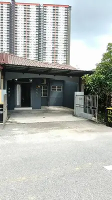 a blue house with a gate and a building at Homestay Manjung HZ in Sitiawan