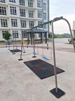 an empty playground in front of a building at Anderson Zara Homestay in Ipoh