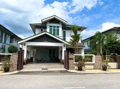 a large white house with a driveway at Bungalow in exclusive area in Nibung Tebal