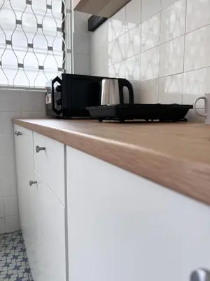 a toaster sitting on top of a kitchen counter at Canning 48 in Ipoh