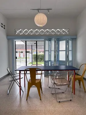 a dining room with a table and chairs at Canning 48 in Ipoh