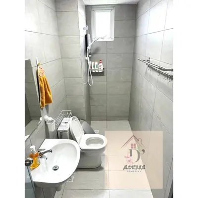 a bathroom with a toilet and a sink at D' Alyssa Homestay Perda in Bukit Mertajam
