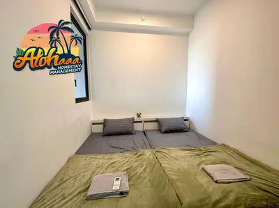 a bedroom with a large bed in a room at Urban Suite Modern Lifestyle Seaview Georgetown in Jelutong