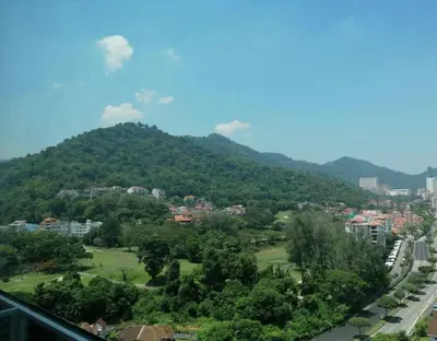 a view of a city and a mountain at The CEO Executive Suites in Bayan Lepas