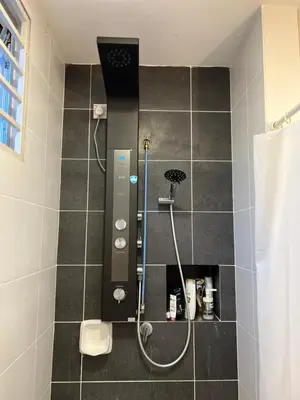 a bathroom with a shower with a shower at GardenView Home in Sungai Petani in Sungai Petani