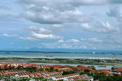 a view of a city and a body of water at 118 Island Plaza ComFy Seaview Suite in Tanjong Tokong