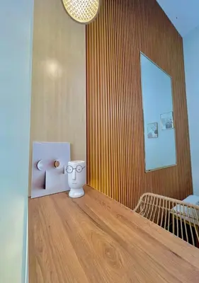 a room with a vase sitting on a wooden floor at Polo Stay, 4 bedroom Single Storey house Ipoh for 10 pax in Ipoh