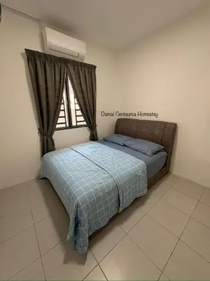 a bedroom with a bed and a window at Damai Centaurea Homestay Utp Uitm Seri Iskandar Perak in Seri Iskandar
