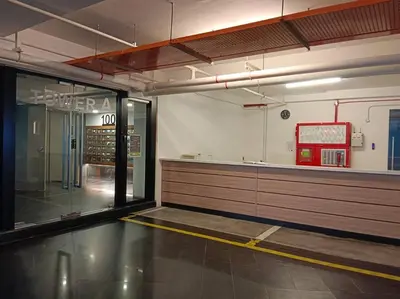 a empty room with a door to a store at LM HomeyC 3BR Family Suite for 4-14 Pax with Nexflix & Coway Water Purifier in Tanjong Tokong