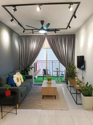 a living room with a couch and a ceiling fan at Dream studio Emerald avenue in Cameron Highlands