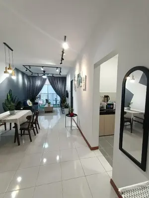 a living room with a table and a dining room at Dream studio Emerald avenue in Cameron Highlands