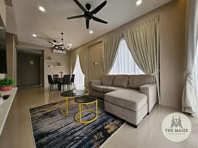a living room with a couch and a table at The Cove Hillside Residence - Grandiose Oasis in Ipoh