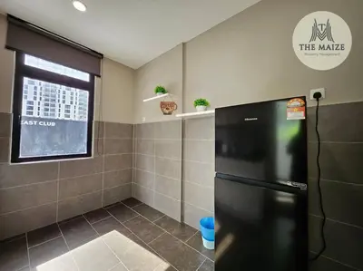 a kitchen with a black refrigerator and a window at The Cove Hillside Residence - Grandiose Oasis in Ipoh