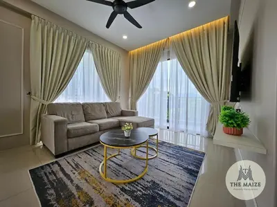 a living room with a couch and a table at The Cove Hillside Residence - Grandiose Oasis in Ipoh