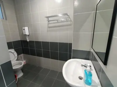 a bathroom with a sink and a toilet at Dream 6 Emerald avenue in Cameron Highlands
