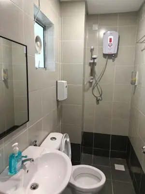 a bathroom with a sink and a toilet at Dream 6 Emerald avenue in Cameron Highlands