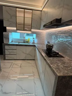 a kitchen with a sink and a counter top at Live Like Your Home, Alma Bukit Mertajam in Bukit Mertajam