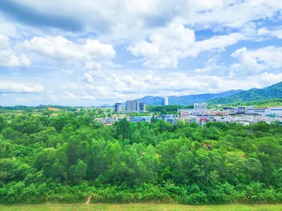 a view of a city with trees and buildings at Ipoh Meru Casa Kayangan 6 Pax Fully Air-Con Homestay in Ipoh