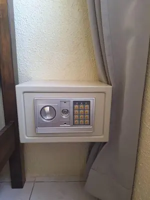 a wall mounted electrical outlet on a wall at Seaput Homes in Ayer Itam