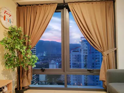 a window with a view of a city at \u69df\u57ce\u4e2d\u8def\u4e09\u623f \u7231\u5c45\u5c4b in George Town