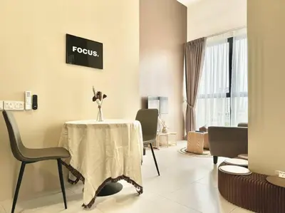 a living room with a table and chairs and a room with at Urban Suites #Walnut 1BR 1Bath suite #Infinity Pool #3pax #1Queen 1Single #Quality well maintained #Private host in Jelutong