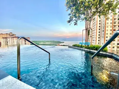 a swimming pool in the middle of a building at Urban Suites #Walnut 1BR 1Bath suite #Infinity Pool #3pax #1Queen 1Single #Quality well maintained #Private host in Jelutong
