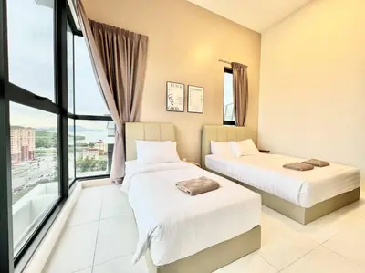 a hotel room with two beds and a large window at Urban Suites #Walnut 1BR 1Bath suite #Infinity Pool #3pax #1Queen 1Single #Quality well maintained #Private host in Jelutong