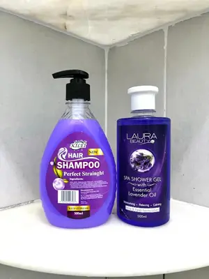 two bottles of shampoo sitting on a shelf at Syapins Cozy Haven Lunas Homestay Musslim Only in Lunas