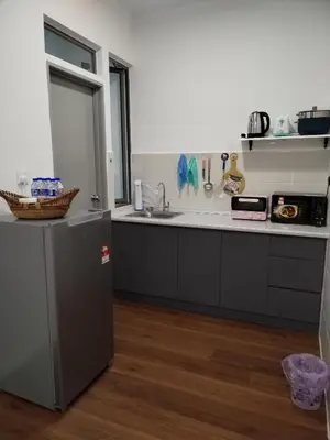 a kitchen with a sink and a counter top at Palas Horizon Home B-7-11 in Brinchang