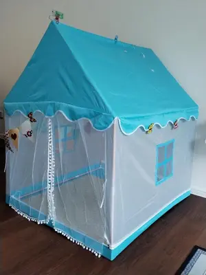 a toy tent with a blue canopy on a wooden floor at Palas Horizon Home B-7-11 in Brinchang
