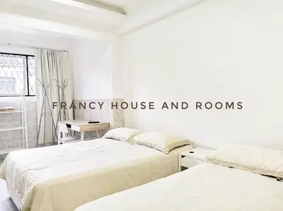 two beds in a white room with the words fancy house and rooms at Semi-D Landed House Bercham Ipoh in Ipoh