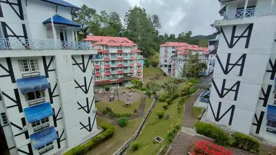 an aerial view of buildings in a city at Desa Anthurium Apartment in Tanah Rata