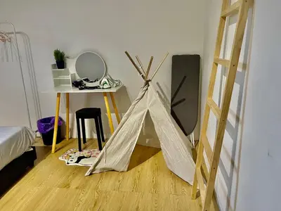 a room with a tent in the middle of a room at Home41#6pax#netflix#NearIconCity&AeonAlma in Bukit Mertajam