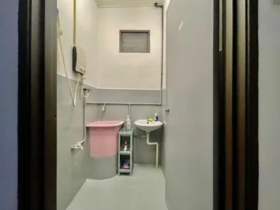 a small bathroom with a sink and a mirror at Home41#6pax#netflix#NearIconCity&AeonAlma in Bukit Mertajam