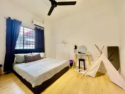 a bedroom with a bed and a play tent at Home41#6pax#netflix#NearIconCity&AeonAlma in Bukit Mertajam