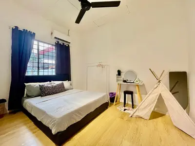 a bedroom with a bed with a tent in it at Home41#6pax#netflix#NearIconCity&AeonAlma in Bukit Mertajam