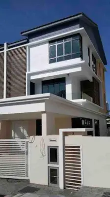 a white house with a fence in front of it at Batu Ferringhi Home Near Beach in Penang in Batu Ferringhi