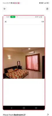 a screenshot of a bedroom with two beds in a room at Lumut Marina in Lumut