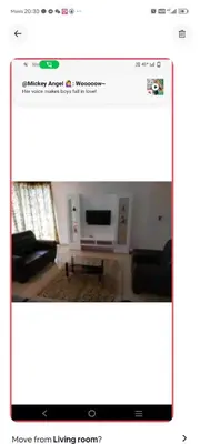 a screenshot of a living room with a tv at Lumut Marina in Lumut