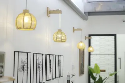 a room with three pendant lights on the wall at Suites Only KKB in Kuala Kubu Baharu