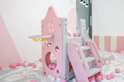 a pink barbie castle playset sitting on a table at Luxury Pokémon Haven with Private Playground Brinchang Cameron Highlands Clover Home 2-28 in Brinchang