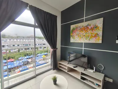 a living room with a tv and a large window at Cameron Golden Hills Near Night Market CH1 in Brinchang