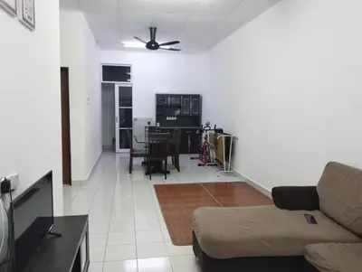 a living room with a couch and a table at Nufa homestay-seri iskandar in Seri Iskandar